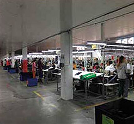 Rows of sewing lines on a large factory floor